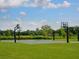 Open basketball court on a sunny day with multiple hoops available for play at 6205 Triple Tail Ct # 101, Lakewood Ranch, FL 34202