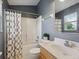 Bathroom featuring a shower/tub, white sink and tile floors at 6205 Triple Tail Ct # 101, Lakewood Ranch, FL 34202