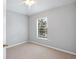 Bedroom with carpet, a ceiling fan and a window at 6205 Triple Tail Ct # 101, Lakewood Ranch, FL 34202