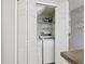 Convenient laundry area features a washer and dryer inside a closet at 6205 Triple Tail Ct # 101, Lakewood Ranch, FL 34202