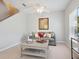 Cozy living room with a comfortable couch, stylish decor, and an inviting atmosphere for relaxation at 6205 Triple Tail Ct # 101, Lakewood Ranch, FL 34202