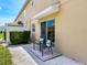 Private patio area with seating, ideal for relaxation and outdoor enjoyment at 6205 Triple Tail Ct # 101, Lakewood Ranch, FL 34202