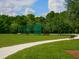 A large recreation area with a field, walking path and scenic surroundings at 6205 Triple Tail Ct # 101, Lakewood Ranch, FL 34202