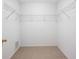 Walk-in closet with carpet and white wire shelving at 6205 Triple Tail Ct # 101, Lakewood Ranch, FL 34202