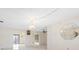 Bright dining room with tile floors and view of the kitchen at 6352 Coniston Ter, North Port, FL 34287