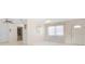 Living room with entryway and adjacent hallway at 6352 Coniston Ter, North Port, FL 34287