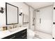 Modern bathroom featuring a sleek vanity and a glass-enclosed shower with subway tile at 6352 Coniston Ter, North Port, FL 34287