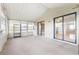 Spacious screened porch with access to backyard at 6352 Coniston Ter, North Port, FL 34287