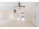 Bright living room with tile floors and access to a screened porch at 6352 Coniston Ter, North Port, FL 34287