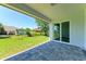 Covered patio with a view of the backyard at 7648 Totem Ave, North Port, FL 34291