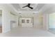 Open concept kitchen with white cabinets and island at 7648 Totem Ave, North Port, FL 34291