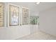 Entryway with stained glass and white brick wall at 117 Villa Dr # 117, Osprey, FL 34229