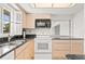 Updated kitchen with granite countertops and stainless steel appliances at 117 Villa Dr # 117, Osprey, FL 34229