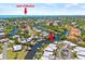 Aerial view of waterfront property with Gulf access, showcasing homes and lush landscaping at 117 Villa Dr # 117, Osprey, FL 34229