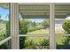 Waterfront view from a screened-in porch at 117 Villa Dr # 117, Osprey, FL 34229