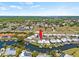 Aerial view of canal-front property with private dock at 117 Villa Dr # 117, Osprey, FL 34229
