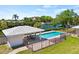 Community pool with covered patio area at 117 Villa Dr # 117, Osprey, FL 34229