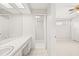 Bright bathroom boasts a vanity with ample storage and an updated shower at 117 Villa Dr # 117, Osprey, FL 34229