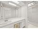 Bathroom with vanity, sink, and shower at 117 Villa Dr # 117, Osprey, FL 34229