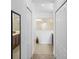 Bathroom with double sinks, large closets, and a walk-in shower at 14538 Barefoot Ln, Parrish, FL 34219