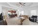 Open concept living room with kitchen and dining area views at 14538 Barefoot Ln, Parrish, FL 34219
