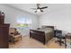 Comfortable bedroom with a large window and a ceiling fan at 14538 Barefoot Ln, Parrish, FL 34219