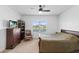 Serene bedroom with water views and plenty of natural light at 14538 Barefoot Ln, Parrish, FL 34219