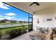 Enjoy the view from this screened patio overlooking a peaceful pond at 14538 Barefoot Ln, Parrish, FL 34219