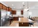 Modern kitchen with stainless steel appliances and granite countertops at 14538 Barefoot Ln, Parrish, FL 34219