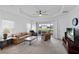 Spacious living room with backyard view and neutral decor at 14538 Barefoot Ln, Parrish, FL 34219
