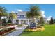 Community clubhouse with landscaping and a welcoming entrance at 14538 Barefoot Ln, Parrish, FL 34219