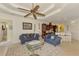 Bright living room with access to kitchen and bath at 1509 Raphis Royale Blvd, Englewood, FL 34223