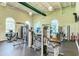 Well-equipped gym with strength training and weight machines at 1509 Raphis Royale Blvd, Englewood, FL 34223