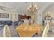 Casual dining area with table and chairs, open to the kitchen and living room at 1509 Raphis Royale Blvd, Englewood, FL 34223