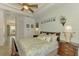Bright and airy main bedroom with ensuite bathroom access at 1509 Raphis Royale Blvd, Englewood, FL 34223