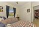 Two twin beds in a spacious bedroom with a view at 1509 Raphis Royale Blvd, Englewood, FL 34223