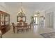 Formal dining room with a chandelier and hardwood floors at 1509 Raphis Royale Blvd, Englewood, FL 34223