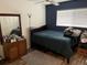 Bedroom featuring a bed, ceiling fan, and natural light from the window at 1540 Glen Oaks E Dr # B336, Sarasota, FL 34232