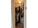 Walk-in closet well organized with ample storage for clothing and accessories at 1540 Glen Oaks E Dr # B336, Sarasota, FL 34232