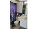 Clean bathroom with shower/tub combo, white vanity, and decorative shower curtain at 1540 Glen Oaks E Dr # B336, Sarasota, FL 34232