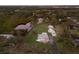 Aerial view of a home on a spacious lot with tranquil surroundings at 1640 Center Rd, Terra Ceia, FL 34250