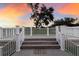 Elevated deck with stairs overlooking a beautiful sunset at 1640 Center Rd # Terra Ceia Island, Palmetto, FL 34221