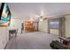 Open concept living room with views into the kitchen and dining area at 1640 Center Rd, Terra Ceia, FL 34250
