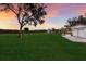 Spacious backyard with detached garage and beautiful sunset view at 1640 Center Rd, Terra Ceia, FL 34250