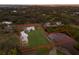 Aerial view of property with boundary lines, lush greenery, and waterfront views at 1640 Center Rd, Terra Ceia, FL 34250
