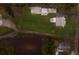 High-angle view of house and expansive backyard at 1640 Center Rd, Terra Ceia, FL 34250