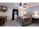 Charming bedroom with a full-size bed and ceiling fan at 1640 Center Rd, Terra Ceia, FL 34250
