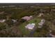 Aerial view of property showing a house and surrounding landscape at 1640 Center Rd, Terra Ceia, FL 34250