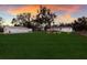 Property view showing house, garage and large backyard at 1640 Center Rd, Terra Ceia, FL 34250