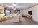 Spacious living room with large windows and comfortable seating at 1640 Center Rd, Terra Ceia, FL 34250